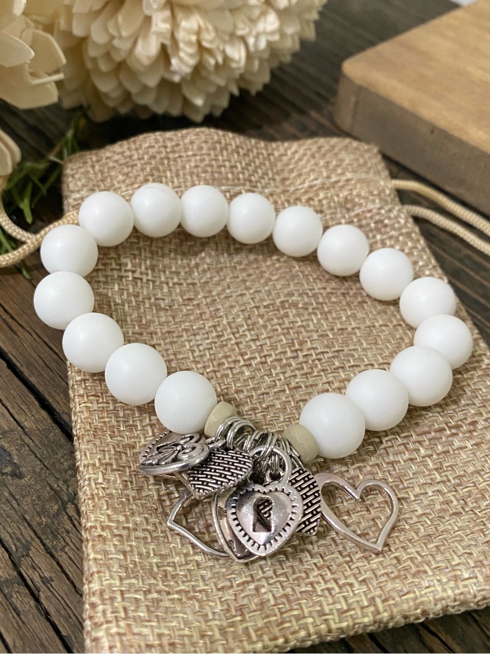 Matte White Beaded Stretch Bracelet with Silver Heart Charms